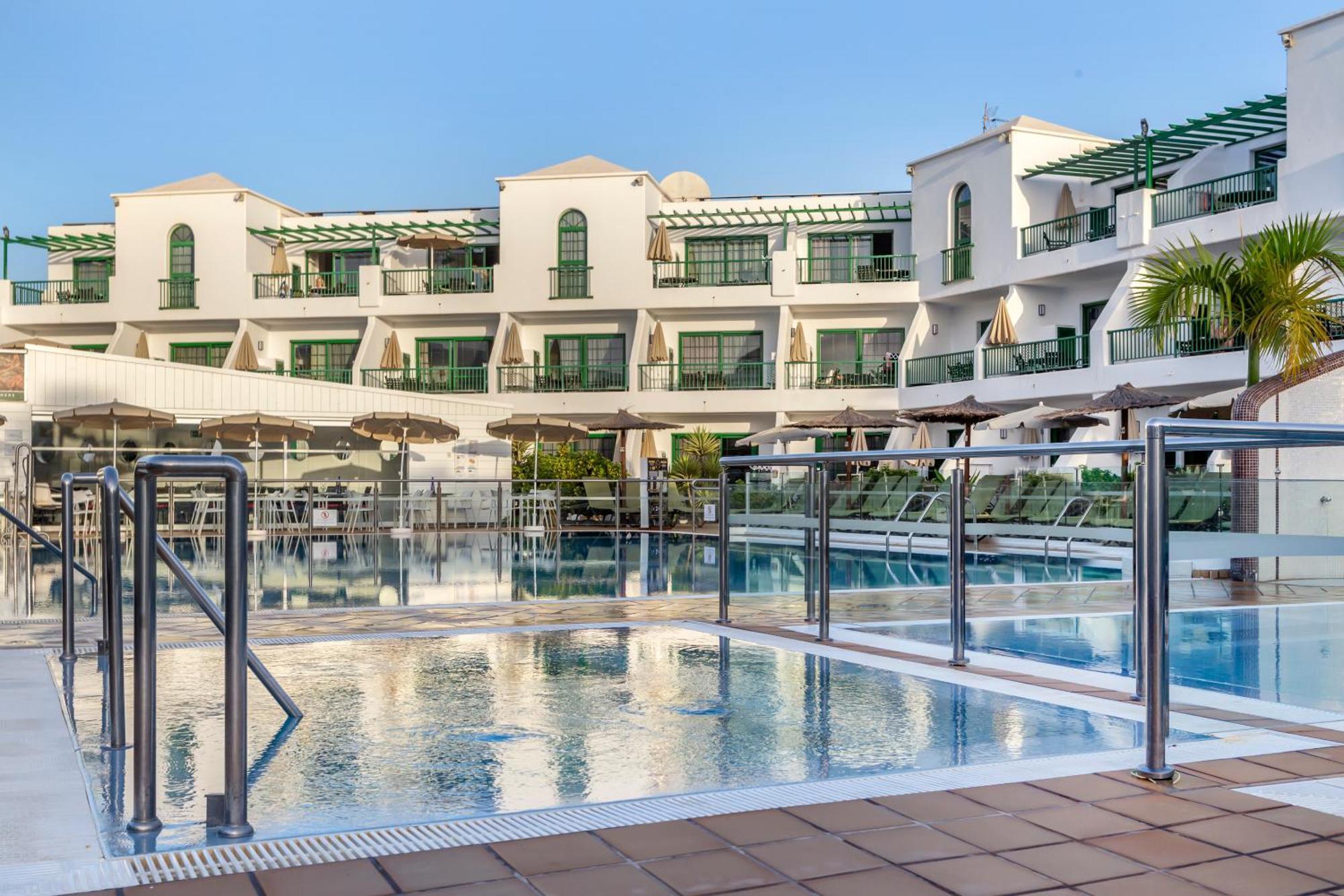 Апарт отель Club Del Carmen Пуэрто дель Кармен Экстерьер фото