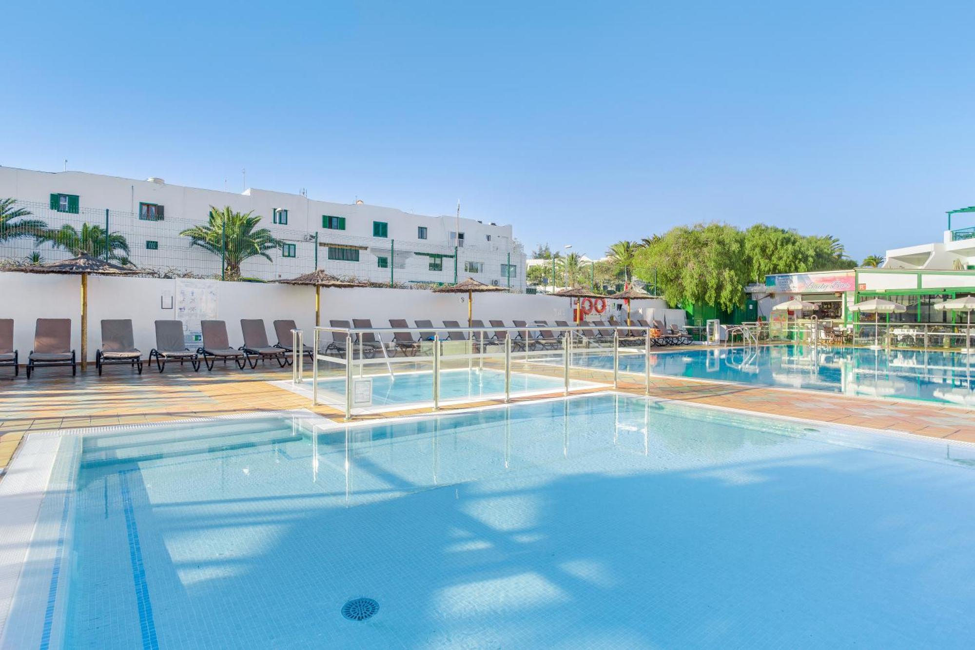 Апарт отель Club Del Carmen Пуэрто дель Кармен Экстерьер фото