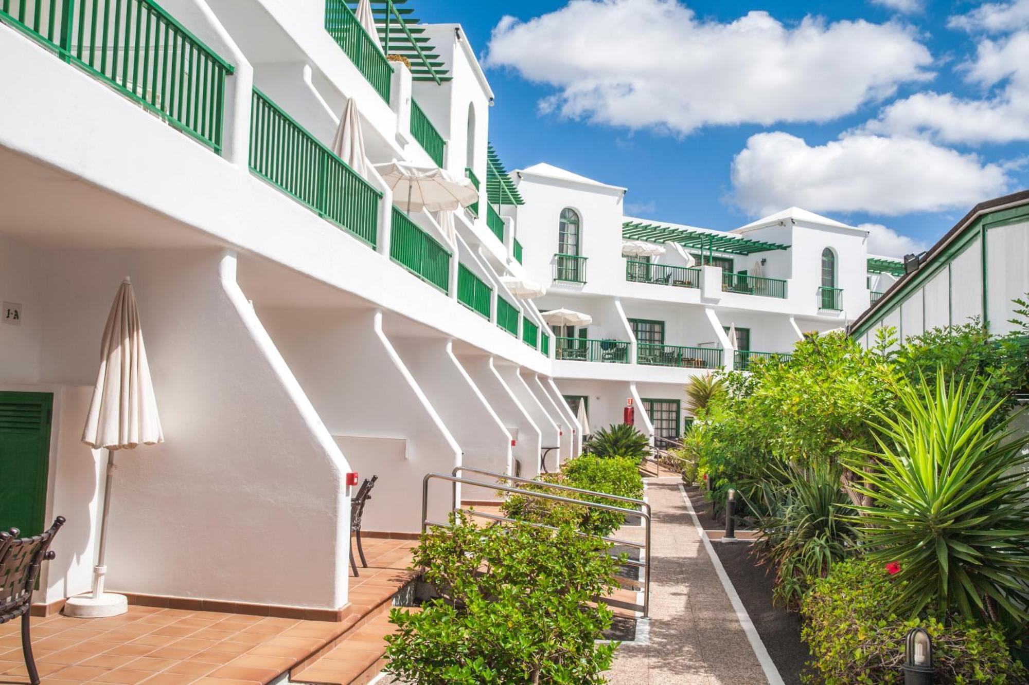 Апарт отель Club Del Carmen Пуэрто дель Кармен Экстерьер фото